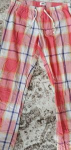 Pink plaid pajama pants.